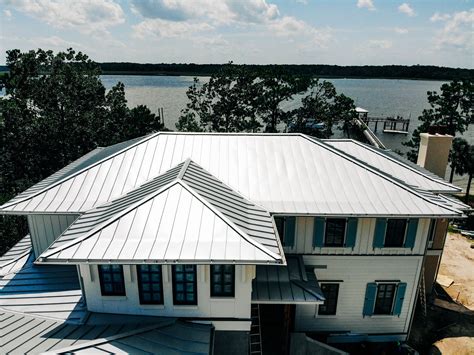 white house with withe metal roof|residential white metal roof.